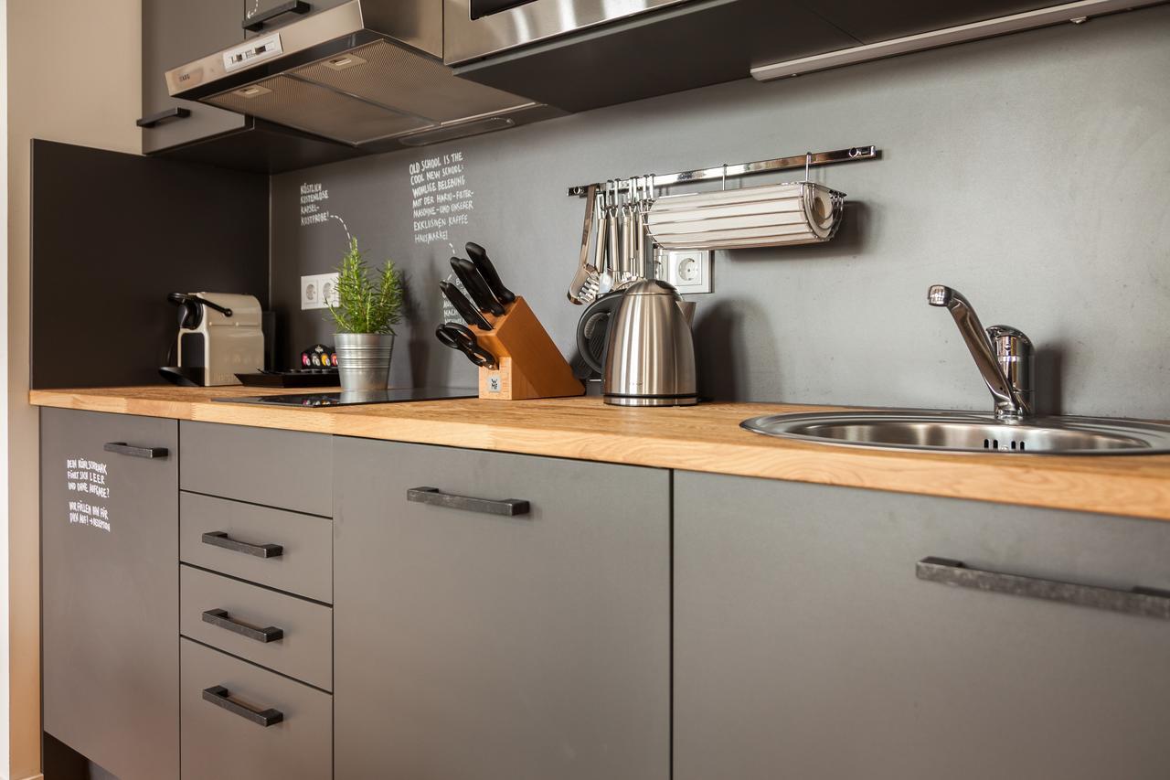 Staycity Aparthotels Dresden City Centre Extérieur photo A kitchen with a wall mounted pot rack